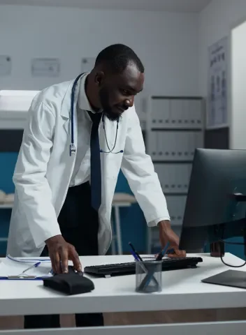african-american-specialist-doctor-monitoring-ill-2026-01-08-02-22-11-utc 1.png